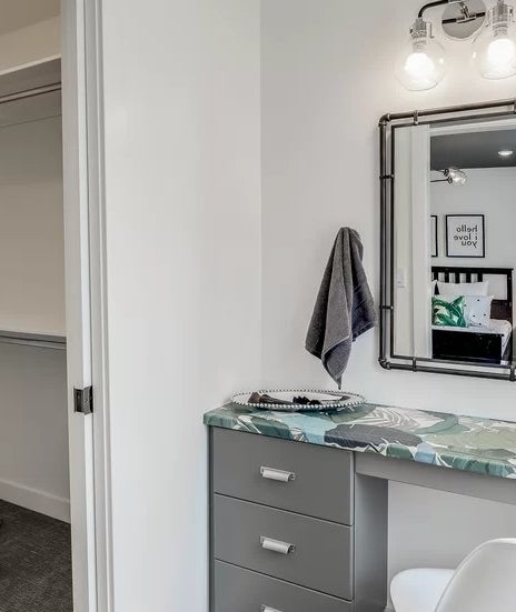 Reviewer image of mirror above gray vanity