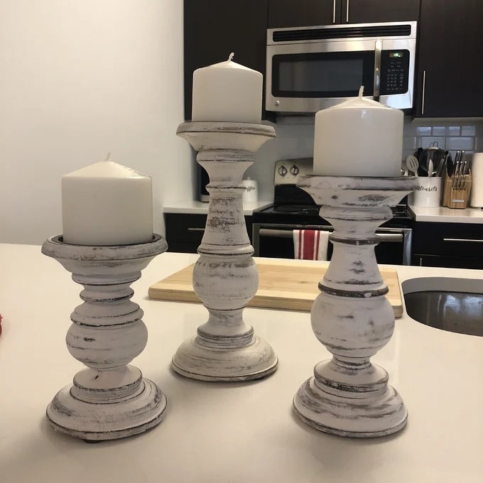 Reviewer image of three candle holders with pillar candles on them