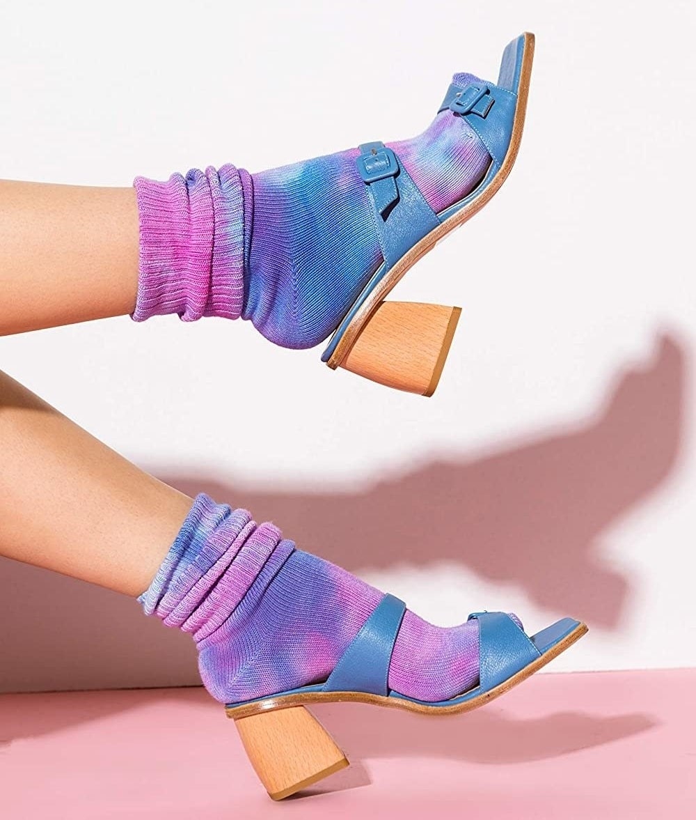 model in purple and pink tie-dye crew socks paired with block heels