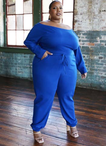 model wearing the jumpsuit in blue