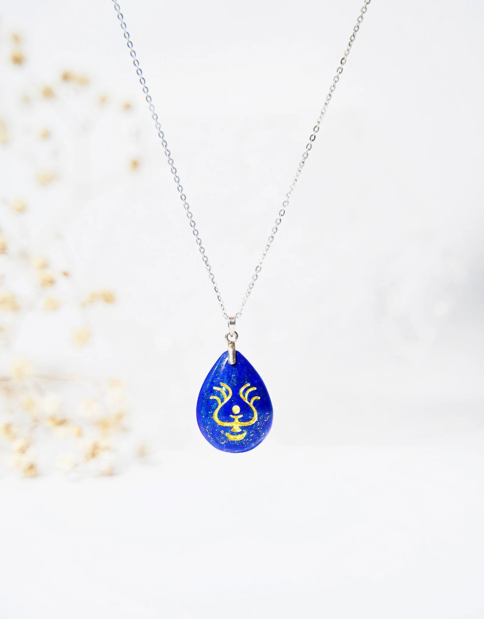 teardrop shaped lapis lazuli pendant with silver chain and symbol like the one in the movie &quot;Castle in the Sky&quot;