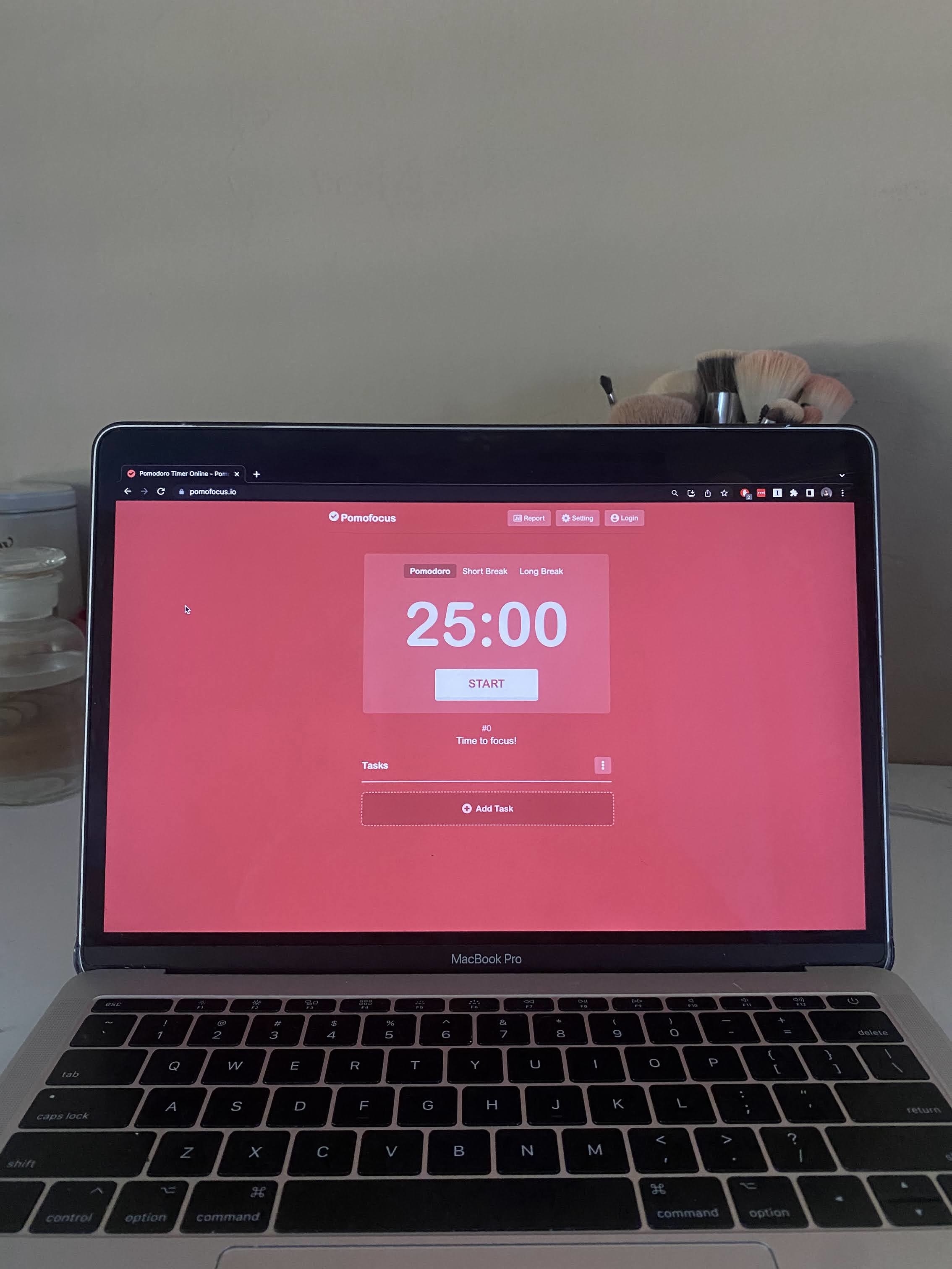 a laptop with a timer on the screen