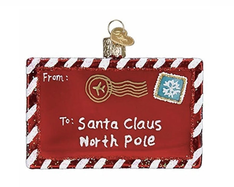 The red sparkly ornament says &quot;To Santa Claus North Pole&quot; with a snowflake stamp and a candy cane edge