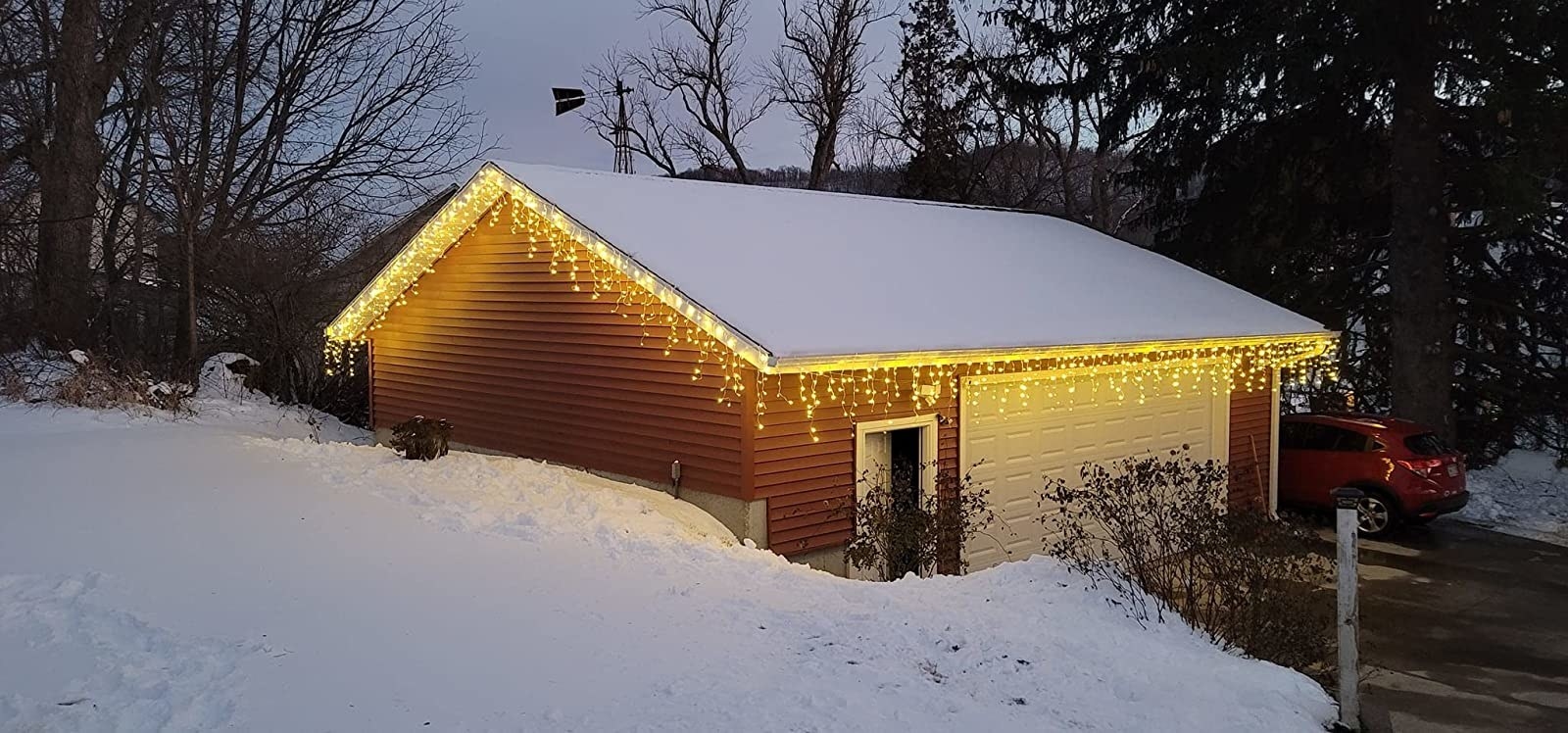Reviewer&#x27;s home with roof outline with the LED twinkling lights