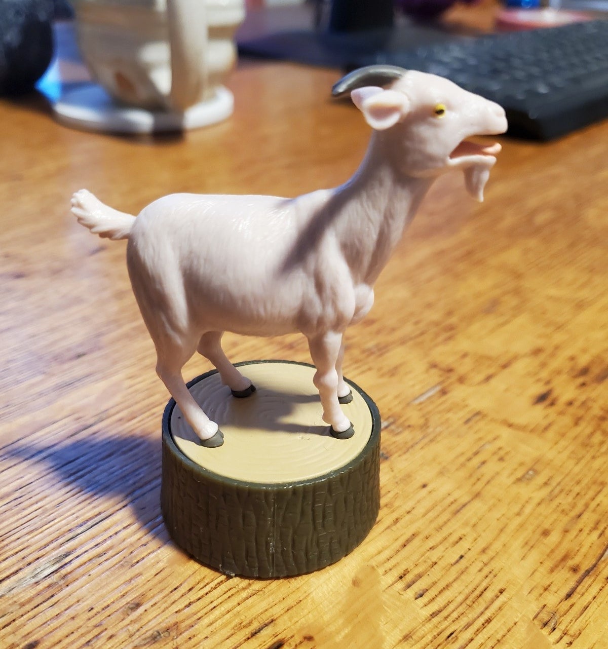 reviewer photo of the screaming goat on a desk