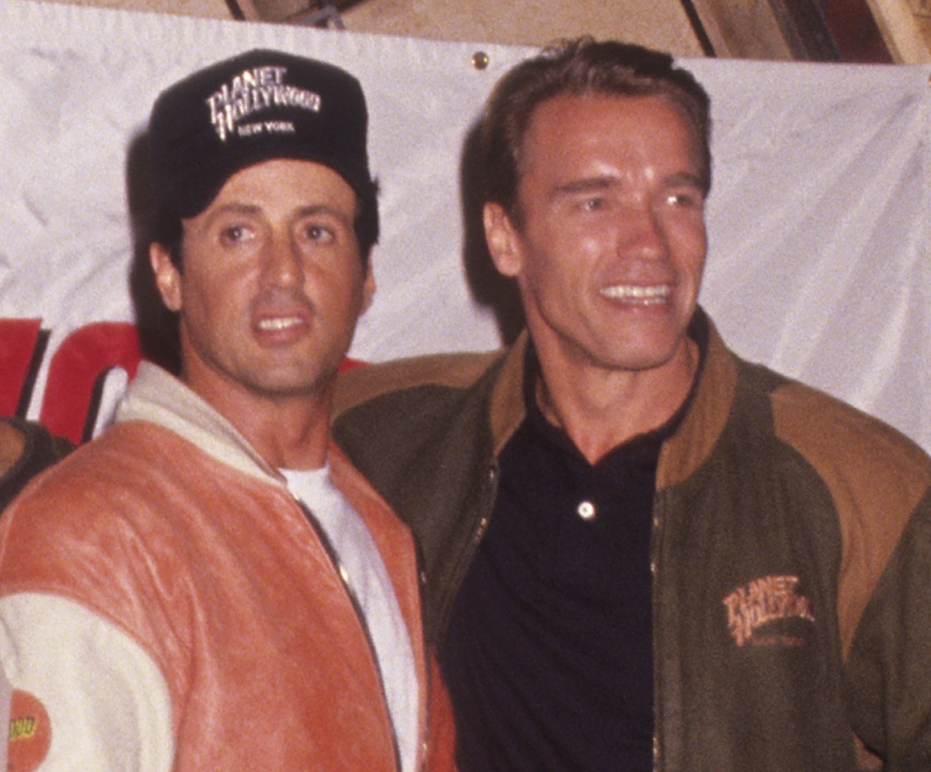 A closeup of Arnold and Sylvester in the 90s