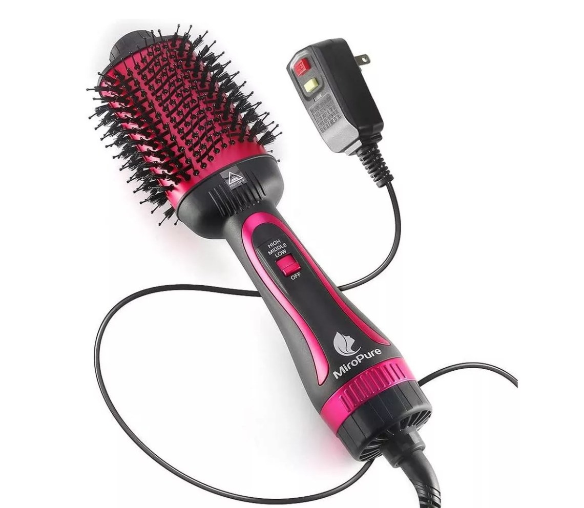 A pink blow dry brush