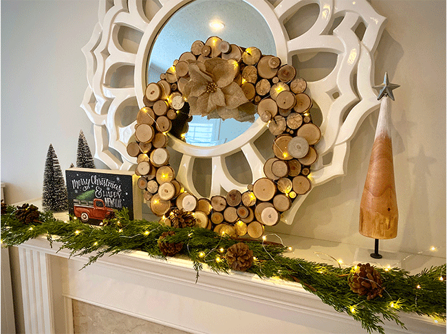 the wreath atop a fireplace