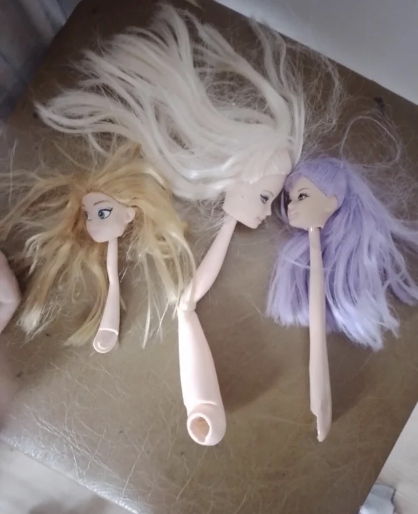 Barbies with heads on their legs