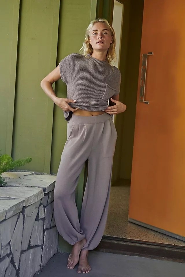 Model wearing the matching grey sweater set