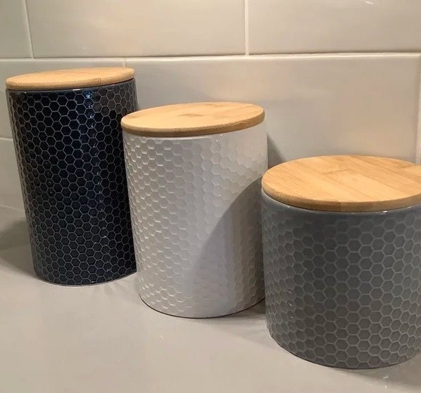 The honeycomb canisters in blue, white, and grey