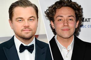 Leonardo DiCaprio wears a dark suit and Ethan Cutkosky wears a dark blazer