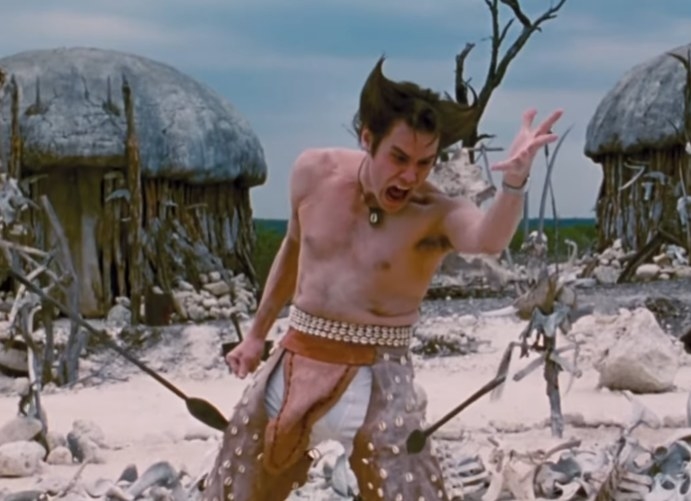 Jim Carrey as Ace Ventura yelling from the pain of having a spear in each leg