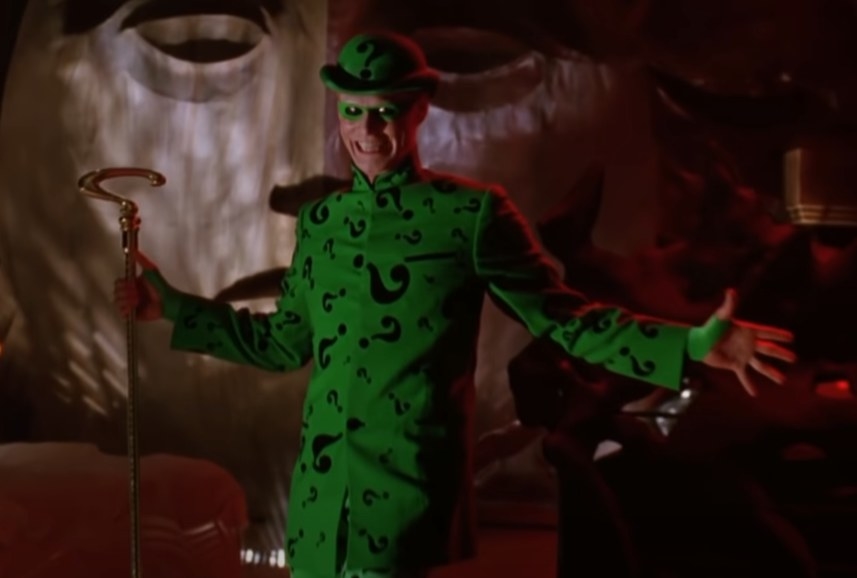 Jim Carrey as The Riddler making an intro into Two Faces lair