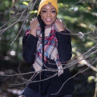 Model in the yellow satin-lined beanie