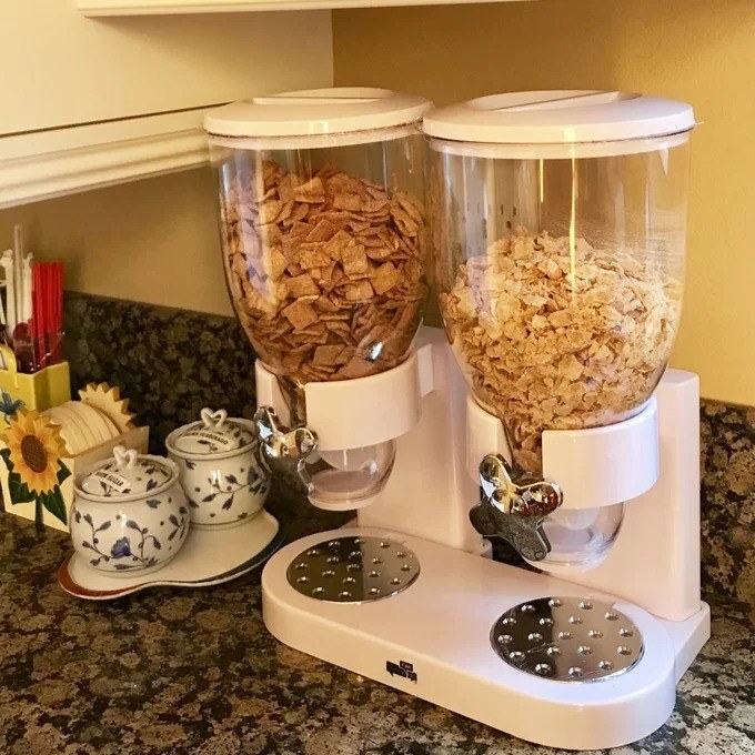 A reviewer image of the cereal dispensers in white on a kitchen countertop
