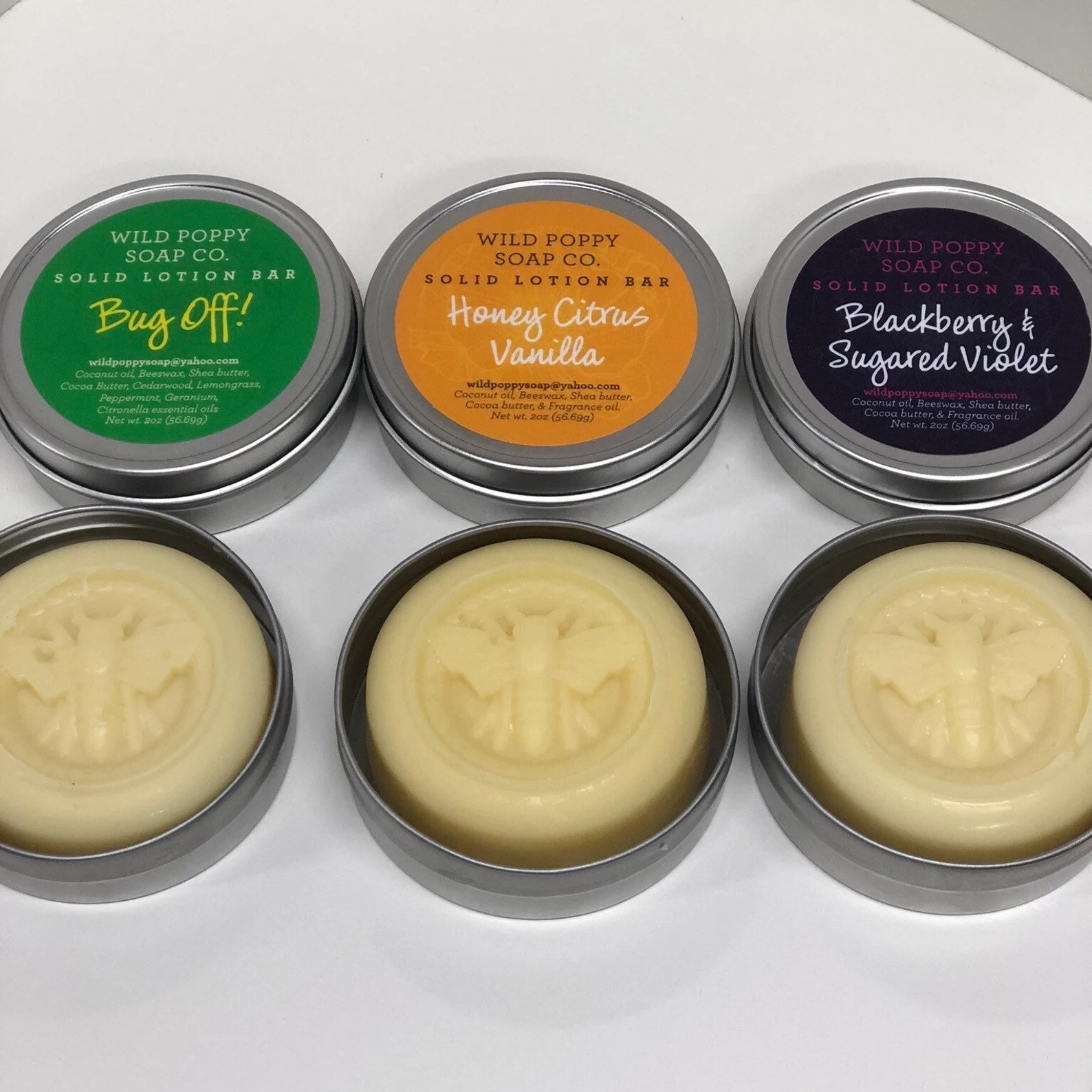 The lotion bars in the scents Bug Off!, Honey Citrus Vanilla, and Blackberry And Sugared Violet