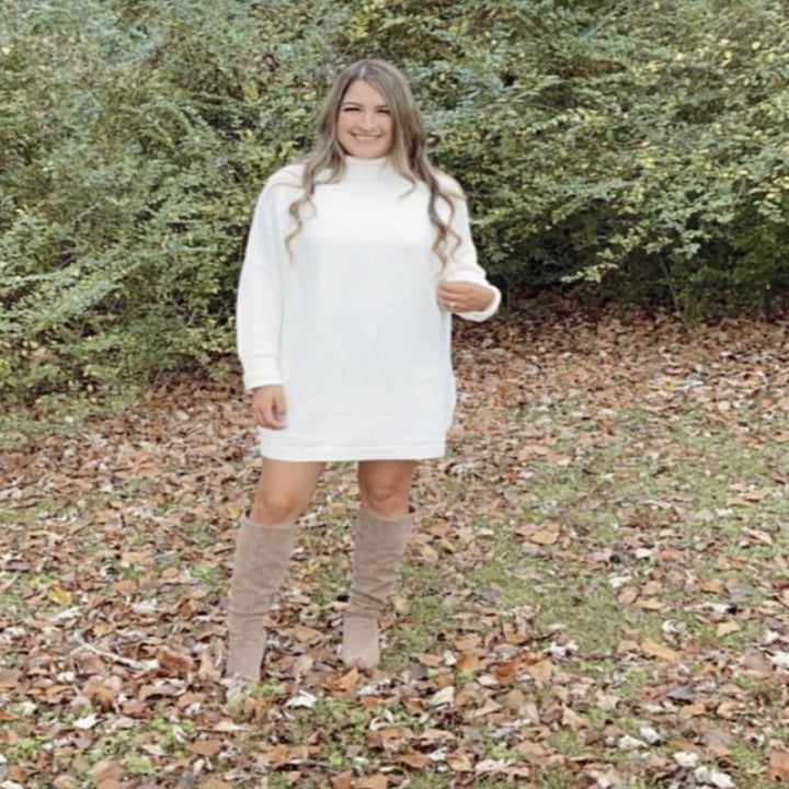 reviewer wearing the dress