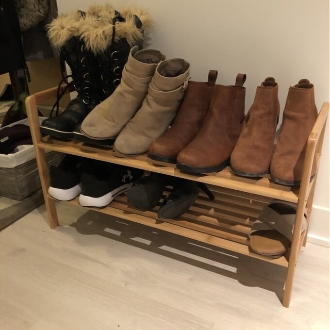 The shoe rack with shoes on it