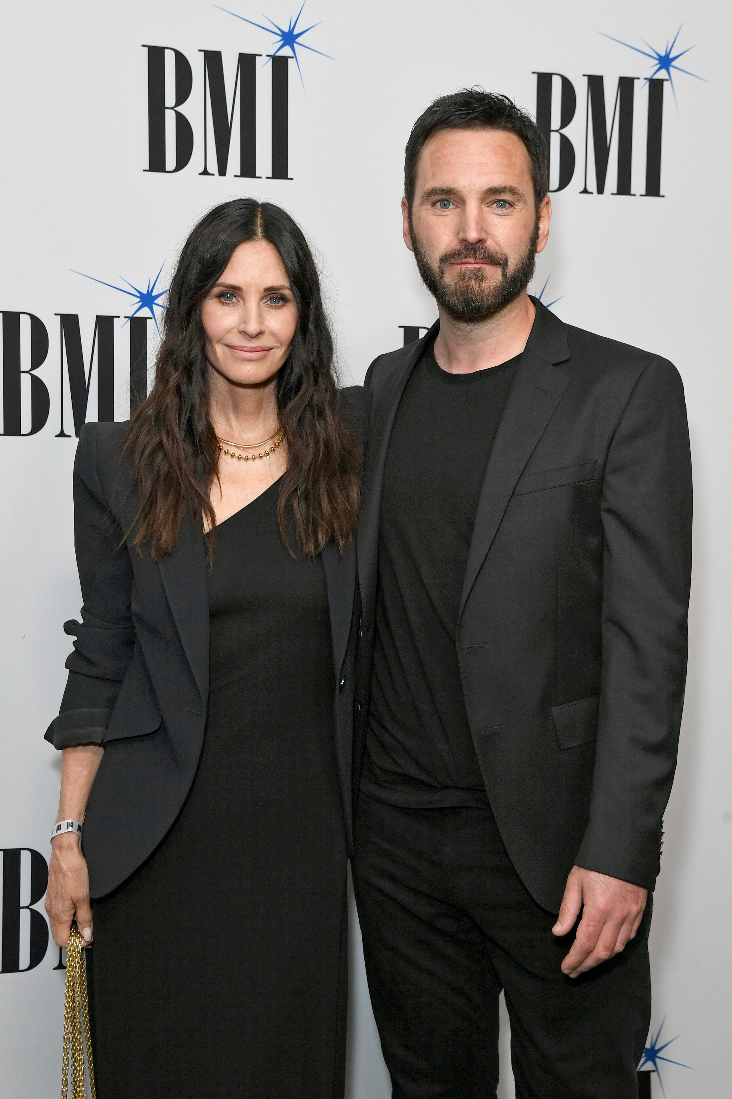 Courteney Cox and Johnny McDaid at an event