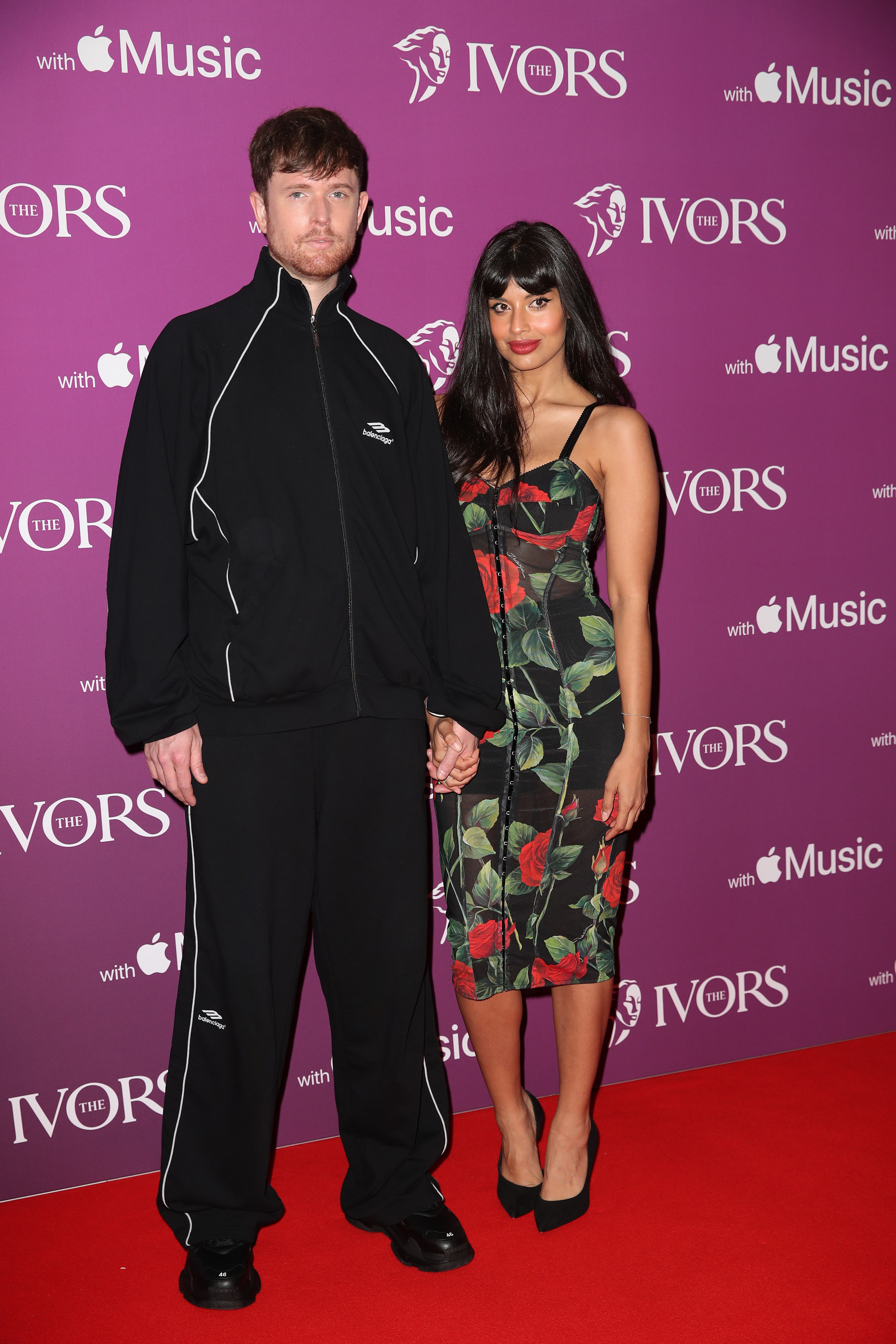 James Blake and Jamila Jameel on the red carpet holding hands
