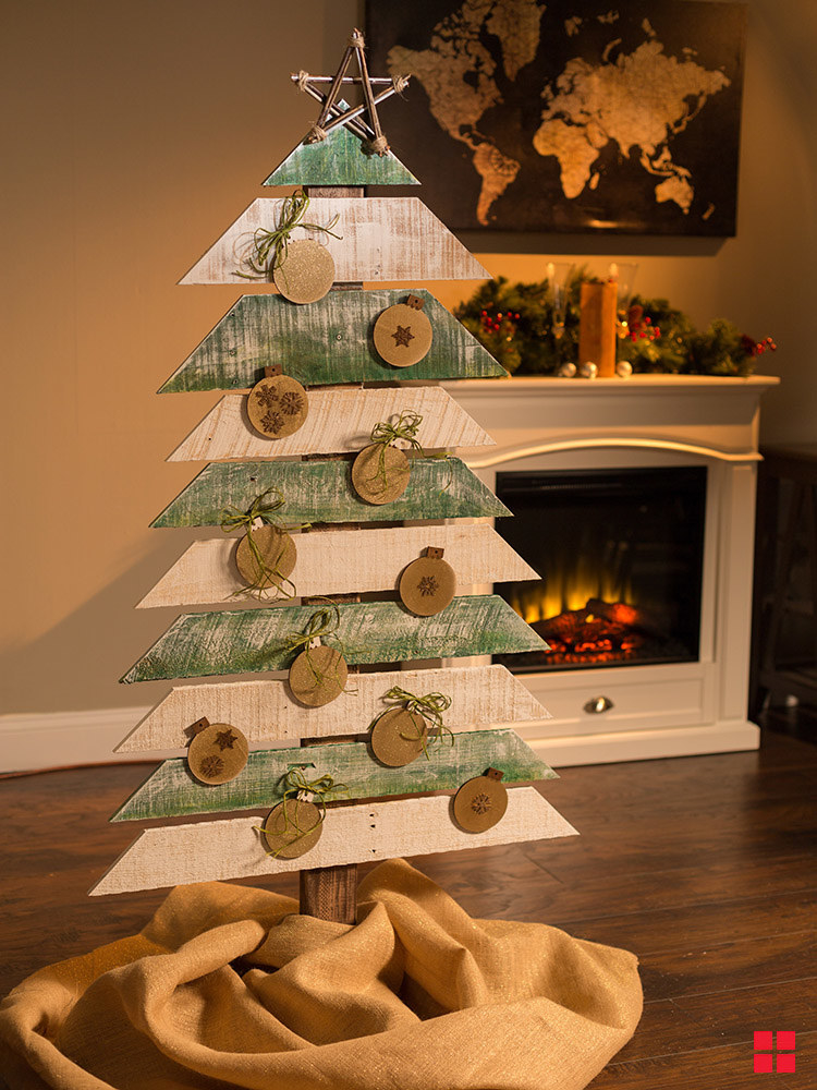 wooden tree holder with wooden ornaments and star