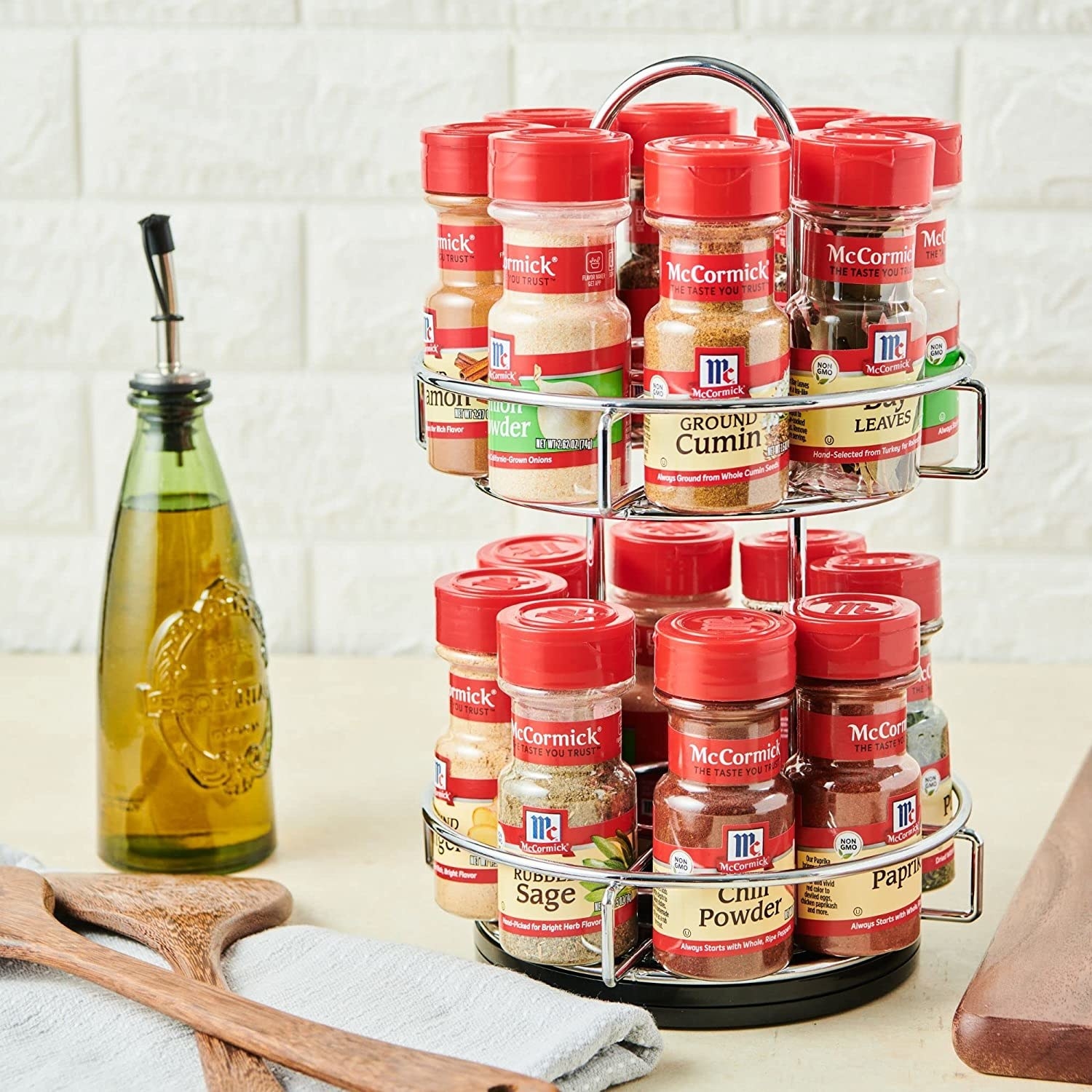 a two tier spice rack filled with mccormick spices