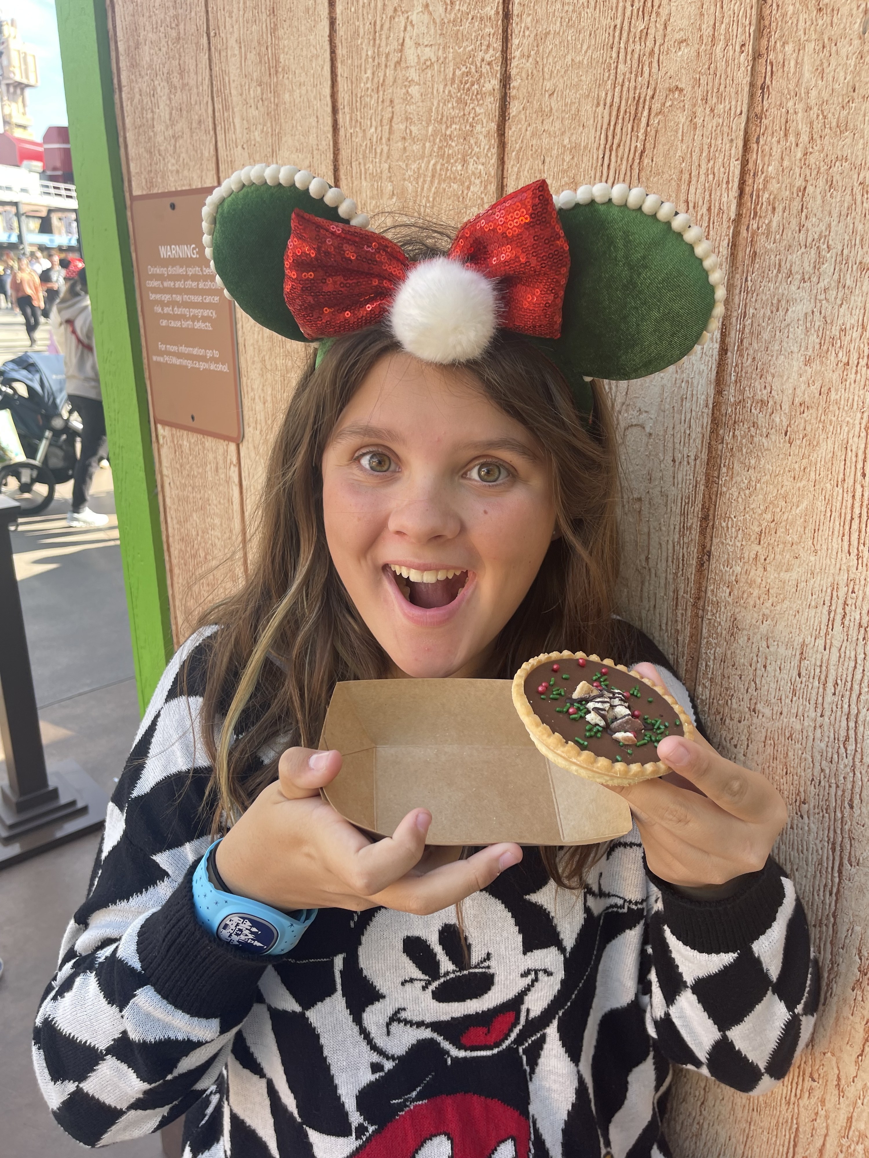 the author&#x27;s daughter looking excited about her dessert