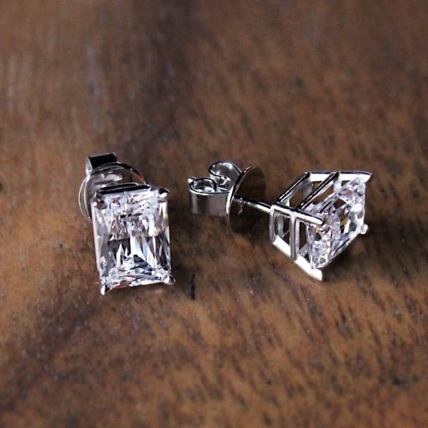 a pair of radiant cut diamond stud earrings