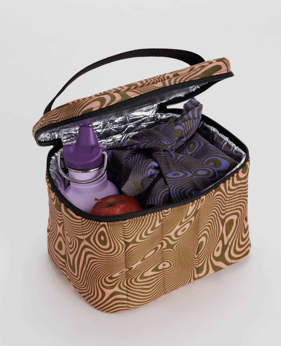 the brown swirly lunchbox with stuff inside