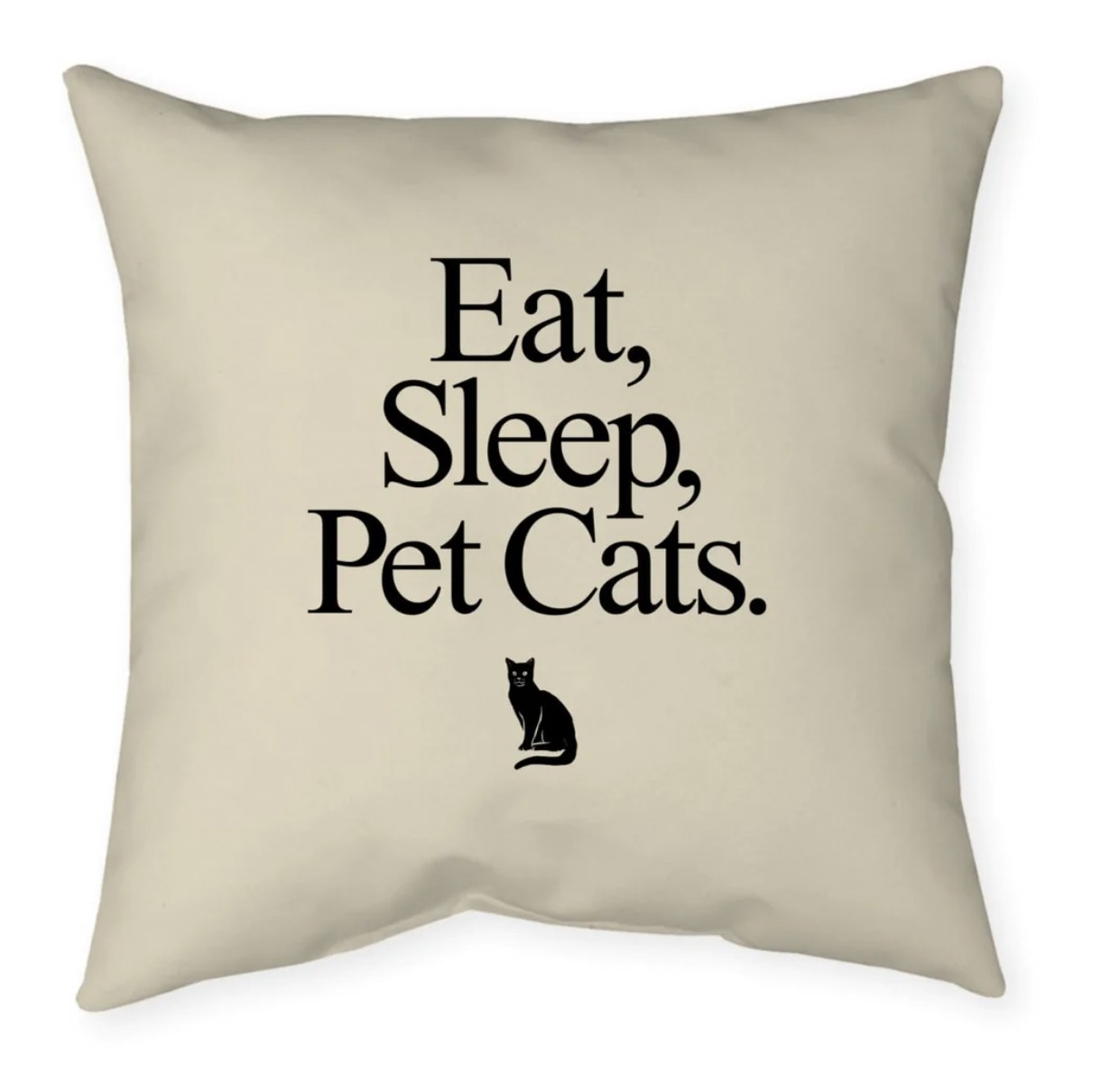 The beige pillow reading Eat, Sleep, Pet Cats. with small black cat beneath