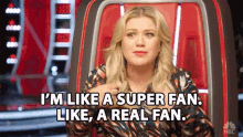 a gif of Kelly Clarkson saying she is a super fan