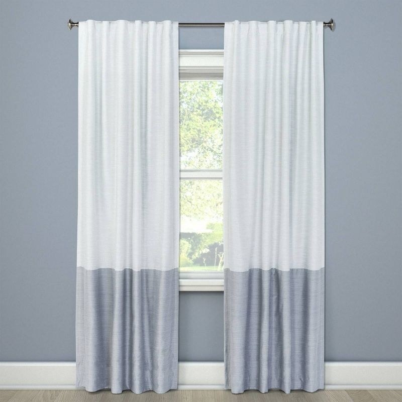 two of the curtain panels in the gray colorway