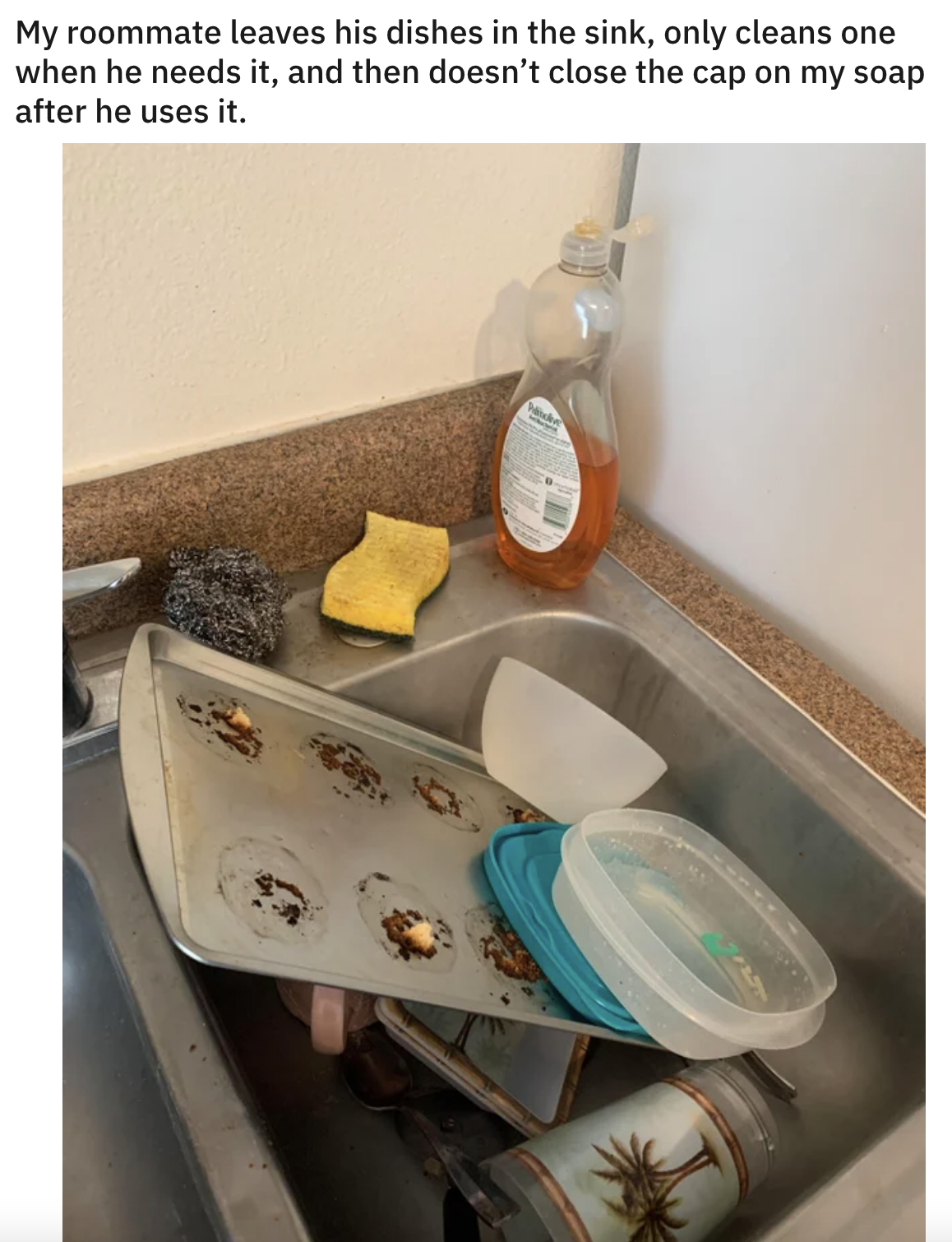 pile of dishes in the sink