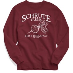 maroon crewneck sweatshirt with beet that says "Schrute Farms Bed and Breakfast"