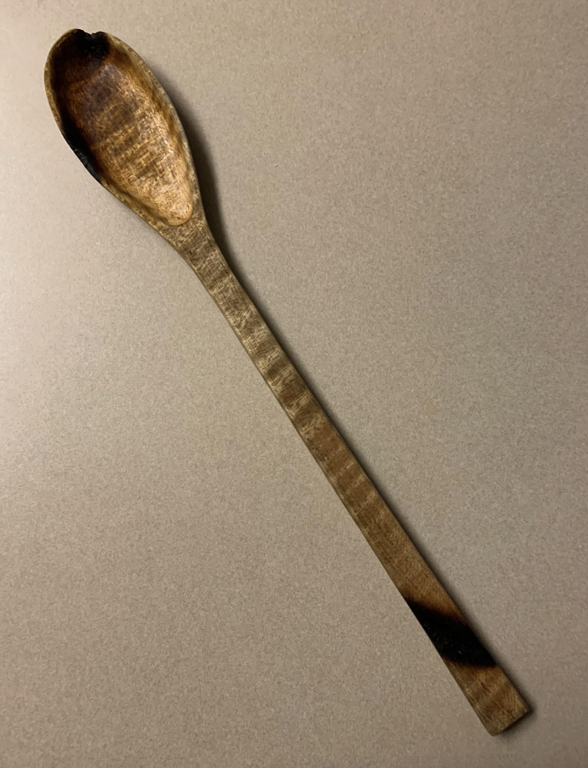 burned wooden spoon