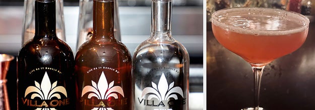 bottles of tequila next to a cocktail