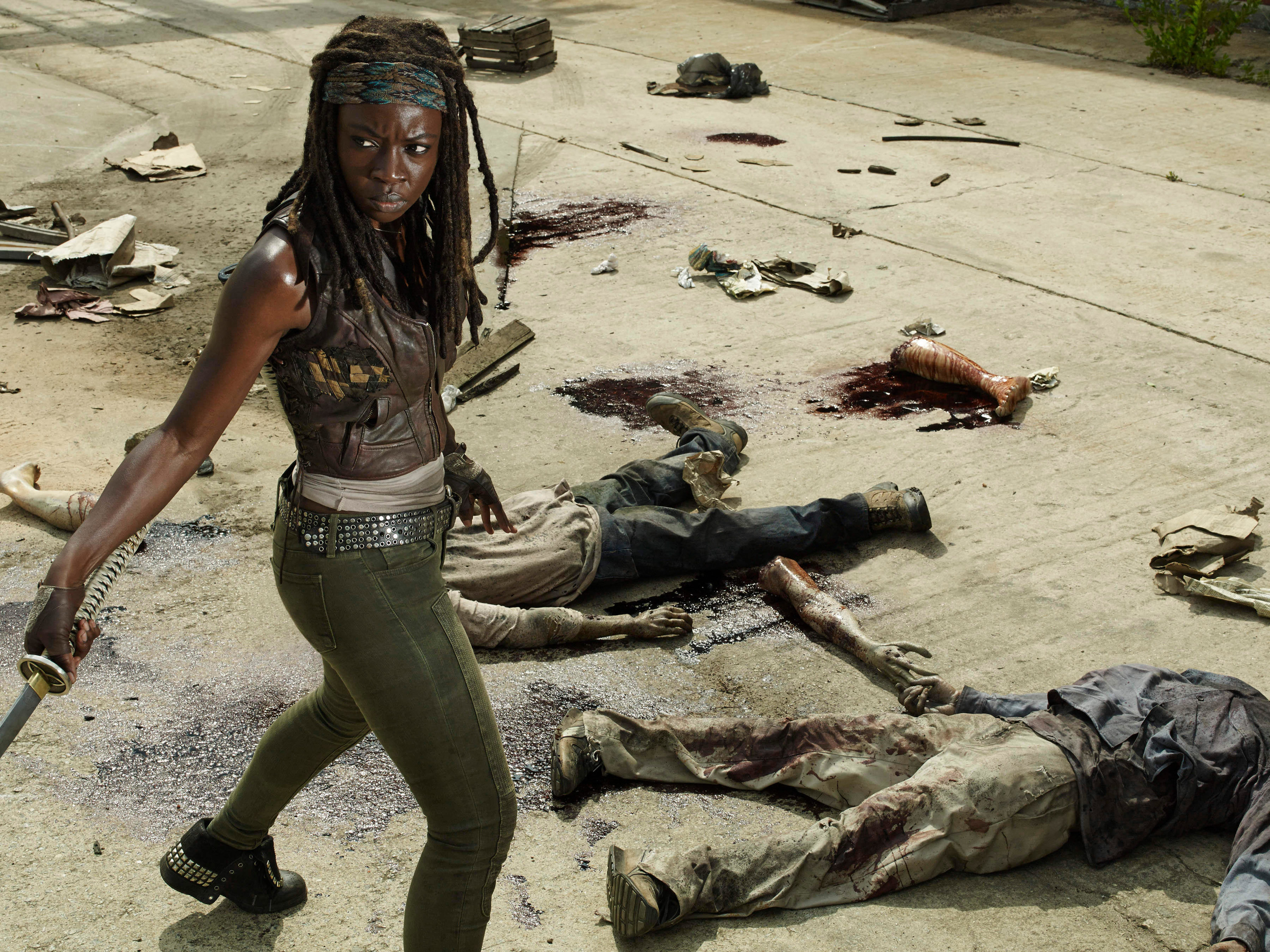 Danai Gurira in The Walking Dead, holding a weapon