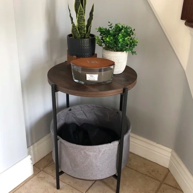 a reviewer photo of the gray and black end table