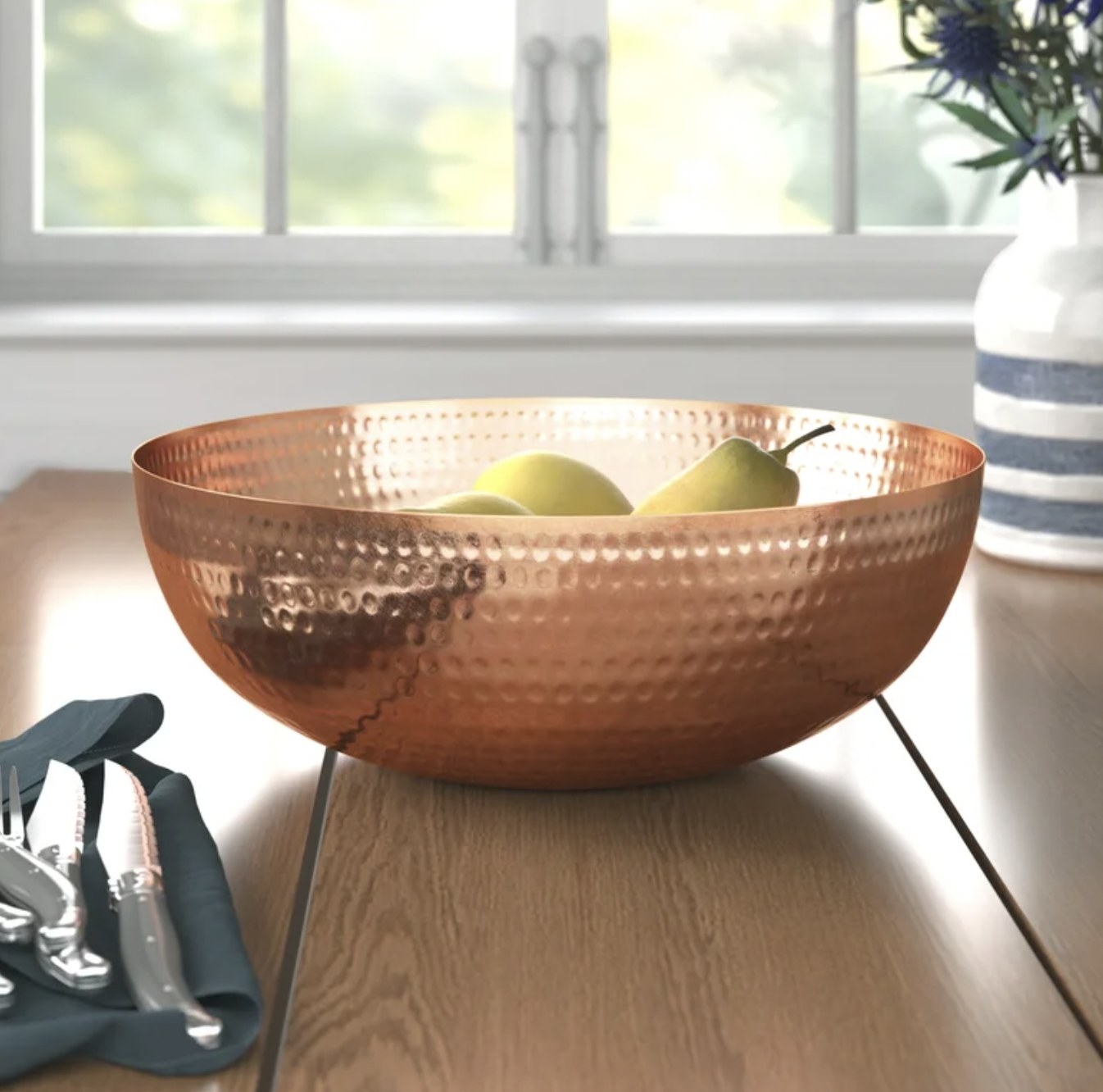 The rose steel bowl with apples and pears