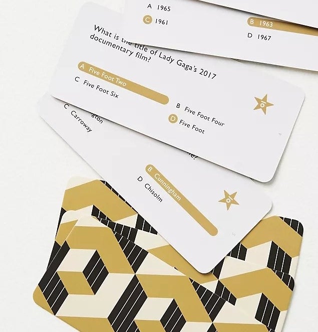 the cards scattered on a plain background