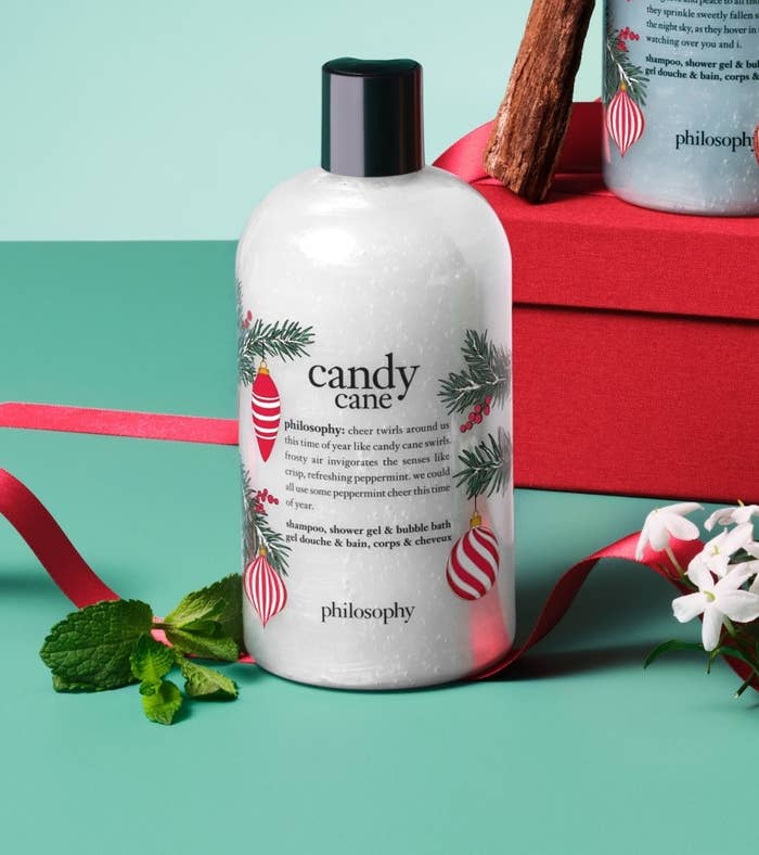 the bottle of shampoo surrounded by holiday ribbon