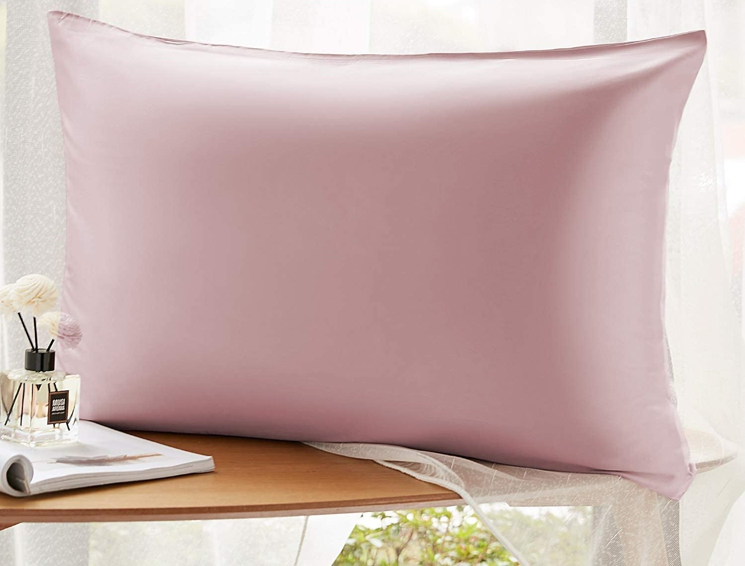 the silk pillowcase on a pillow on top of a table