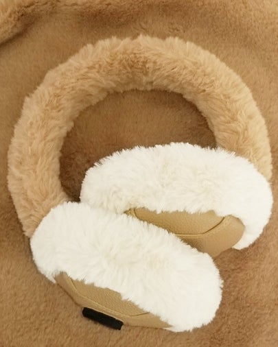 the ear muffs on a blanket