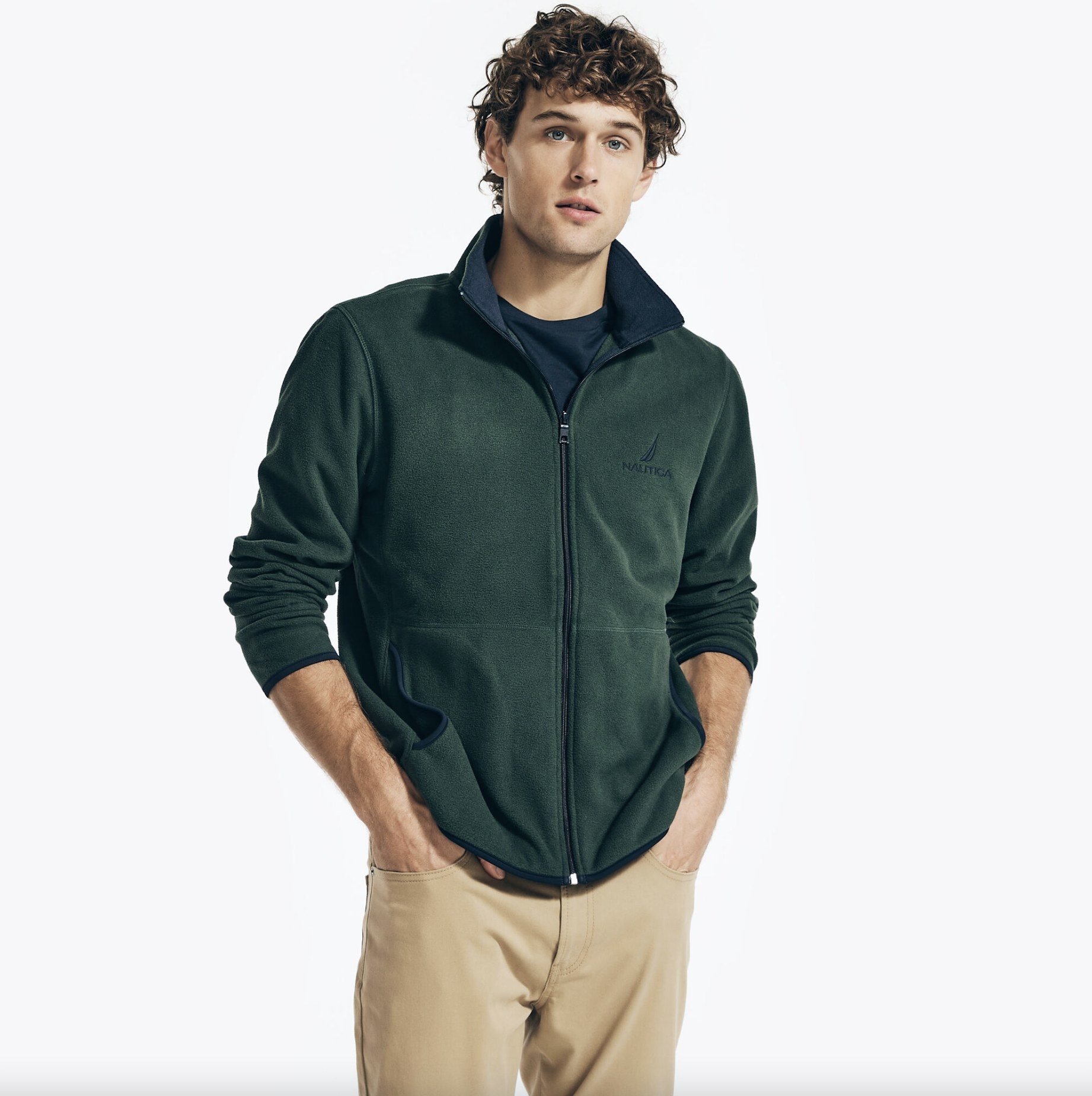model wearing the full zip fleece in green