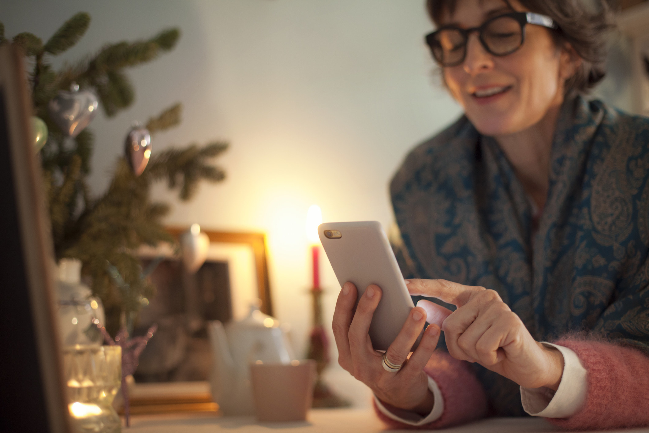 person looking at smartphone