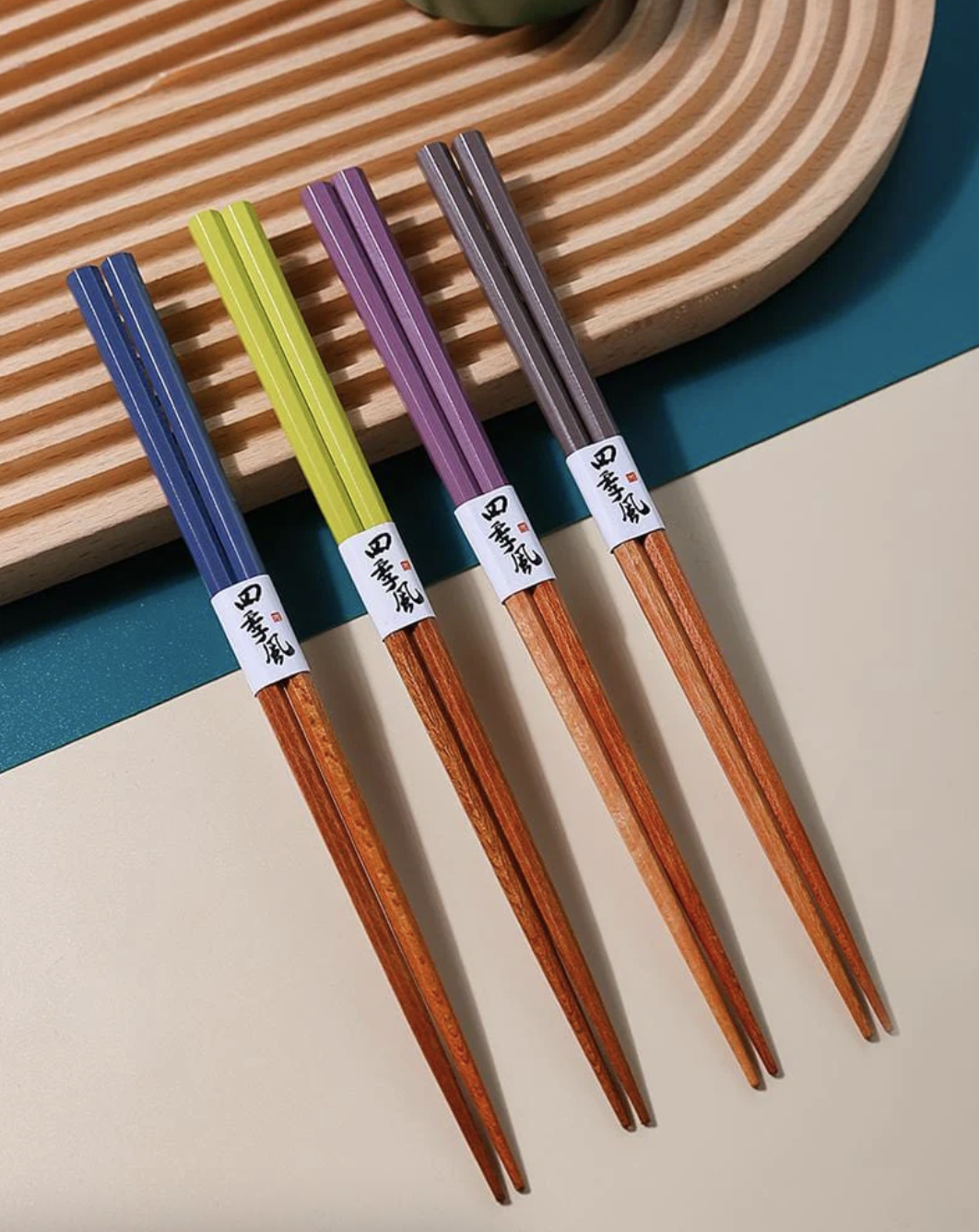 four pairs of two-toned bamboo chopsticks