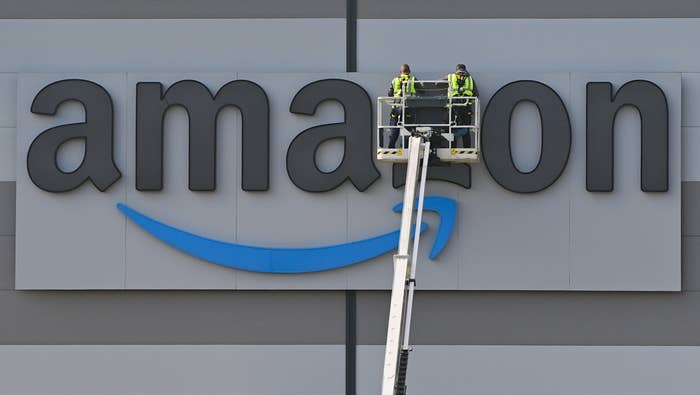 Amazon warehouse sign being repaired