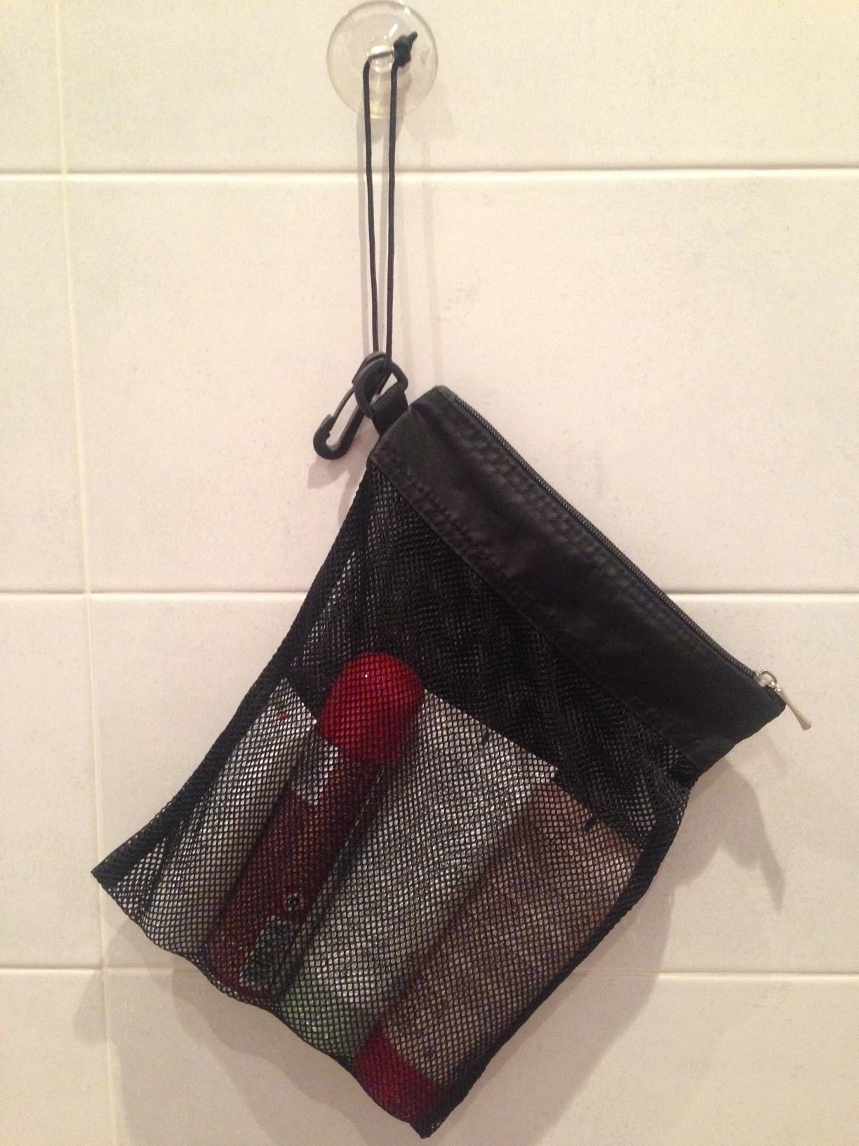 Reviewer&#x27;s photo of the shower tote in use
