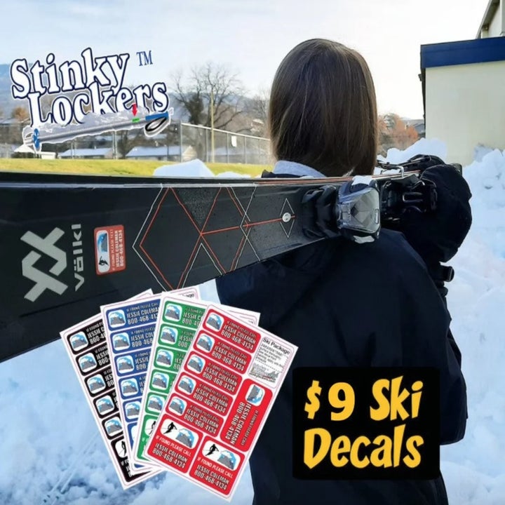 Model holding black skits with red sticker